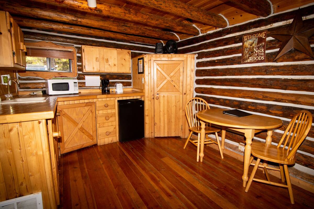 cabin, 1 queen bed | living area | tv