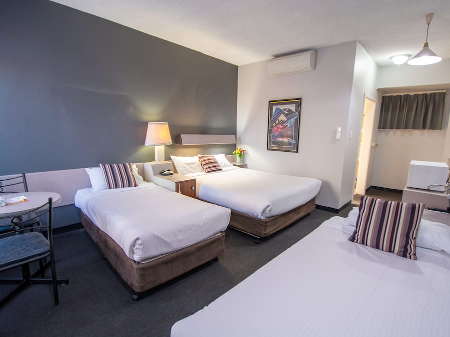 Family Room, 1 Bedroom | Blackout drapes, iron/ironing board, free WiFi, bed sheets