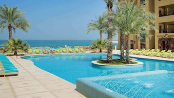 2 indoor pools, outdoor pool, open 8:00 AM to 6:00 PM, pool umbrellas