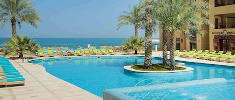 2 indoor pools, outdoor pool, open 8:00 AM to 6:00 PM, pool umbrellas