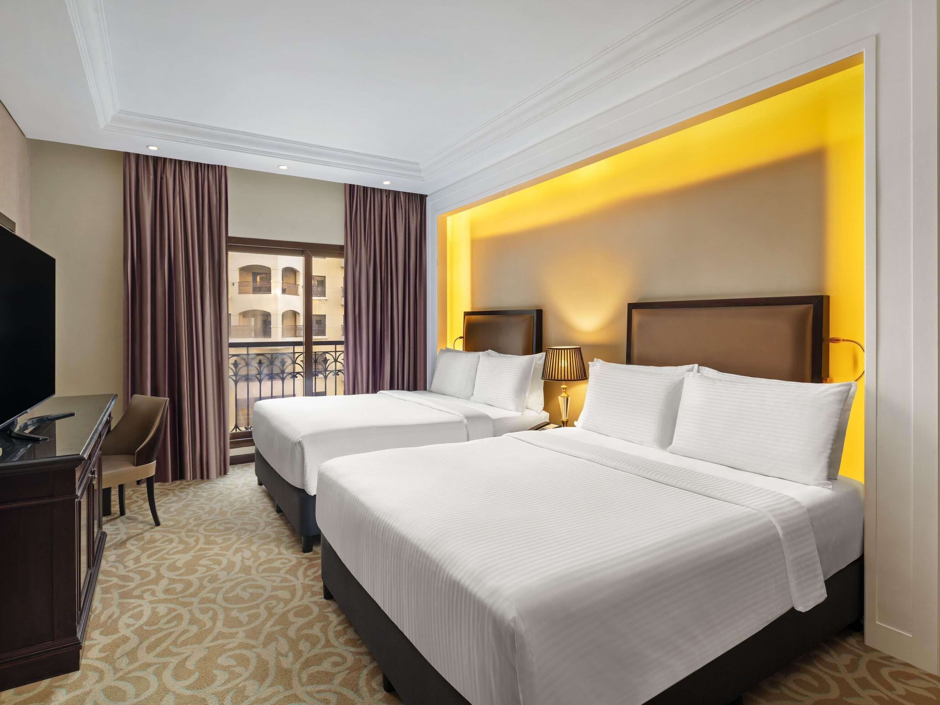 Premium bedding, memory foam beds, minibar, in-room safe