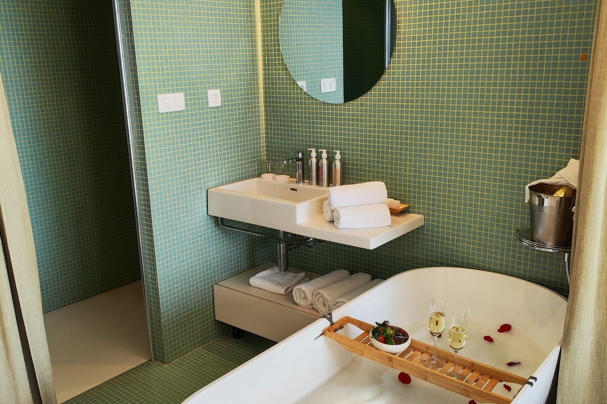 premium suite | bathroom | free toiletries, hair dryer, bathrobes, slippers