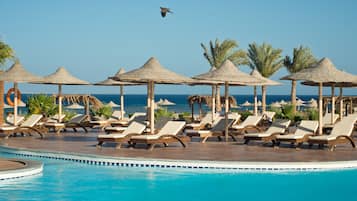 Outdoor pool, pool umbrellas, pool loungers