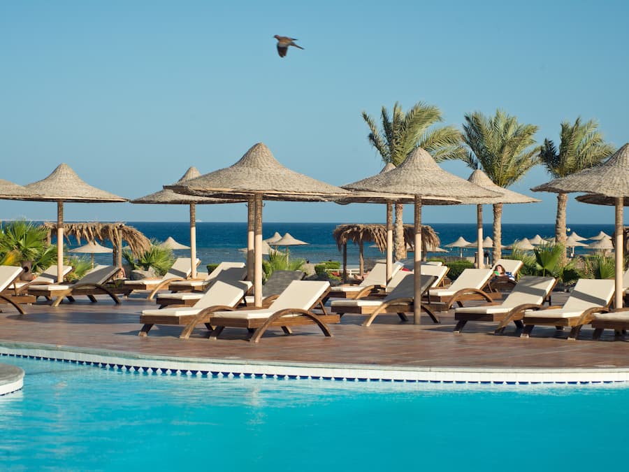 Outdoor pool, pool umbrellas, sun loungers