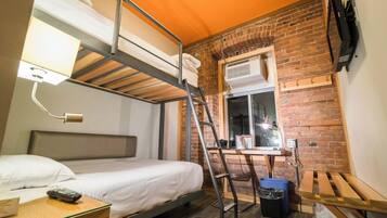 Budget Twin | Down comforters, desk, laptop workspace, iron/ironing board