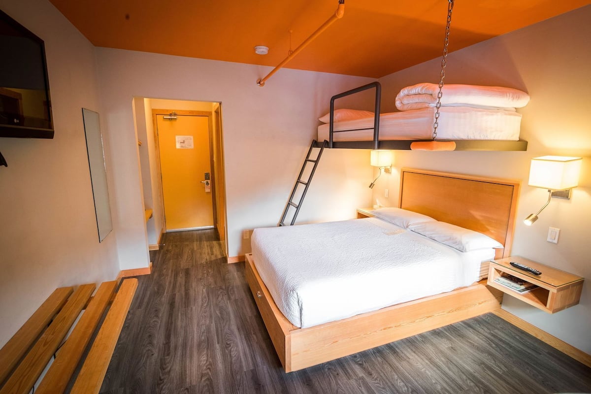 Down duvets, desk, laptop workspace, iron/ironing board