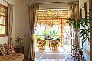 Honeymoon-Suite, King Bed, Terrace w/ Hammock, Partial Ocean View | In-room safe, individually decorated, individually furnished