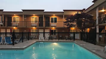 Seasonal outdoor pool, pool umbrellas, sun loungers