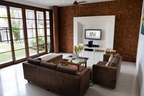 32-inch flat-screen TV with cable channels, LED TV, DVD player