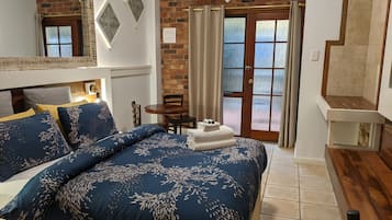 Standard Queen Room - One Queen Bed (Shared Balcony) | Individually decorated, individually furnished, blackout curtains