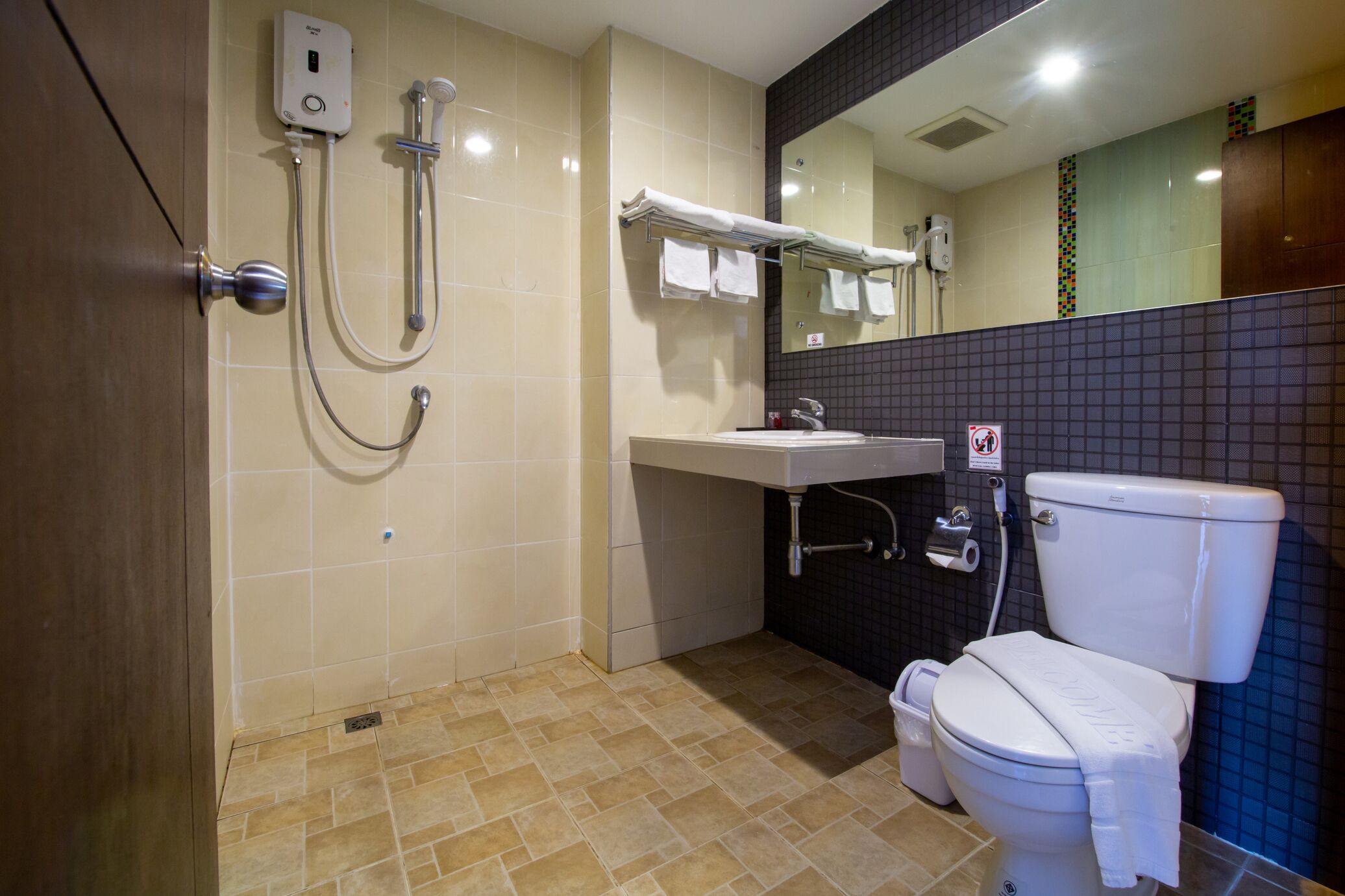 superior twin room | bathroom | shower, free toiletries, hair dryer, towels
