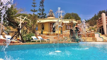 2 outdoor pools, pool umbrellas, pool loungers
