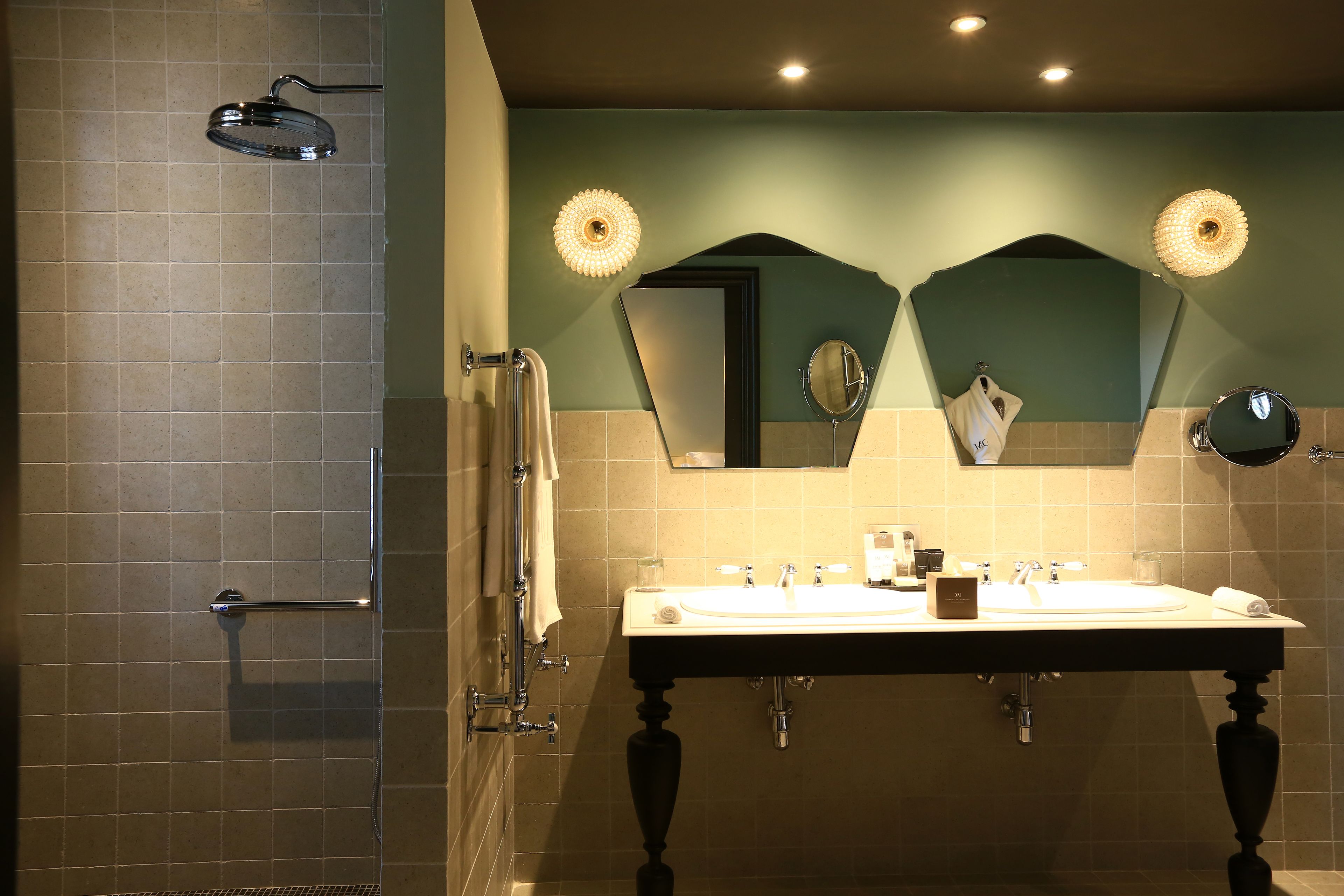 suite family loft | bathroom | designer toiletries, hair dryer, bathrobes, slippers