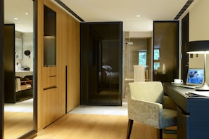Premium bedding, down comforters, minibar, in-room safe