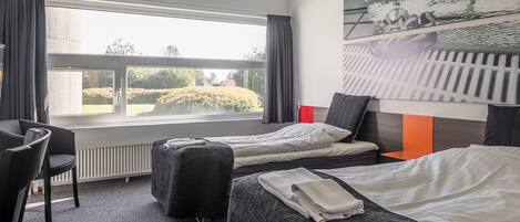 Hypo-allergenic bedding, desk, blackout curtains, soundproofing