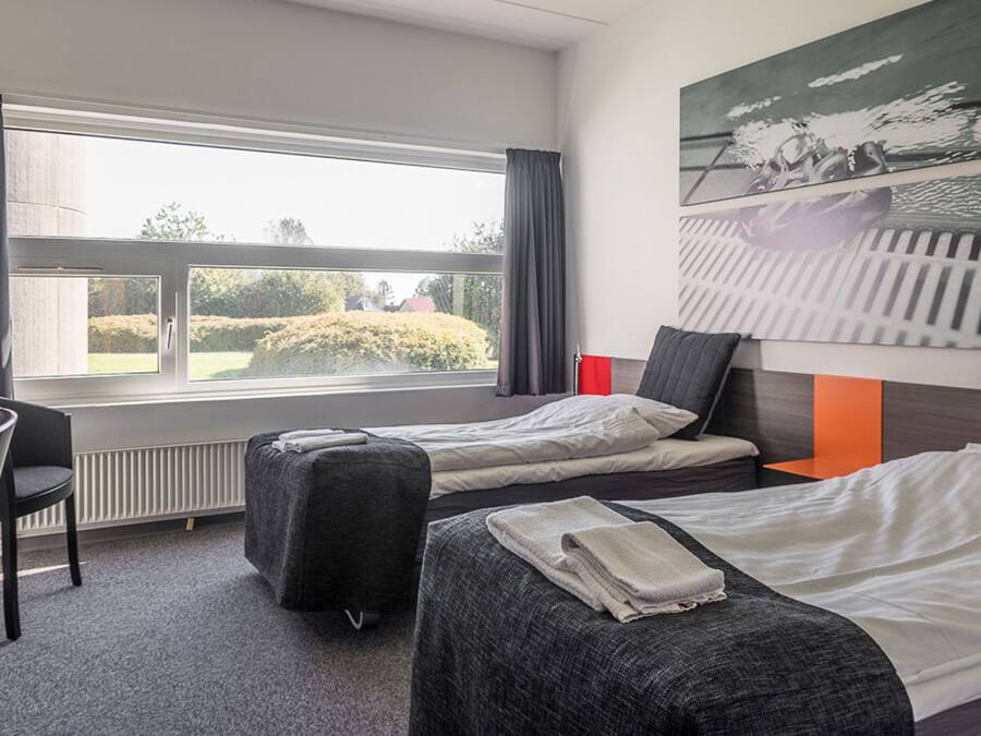 Hypo-allergenic bedding, desk, blackout curtains, soundproofing