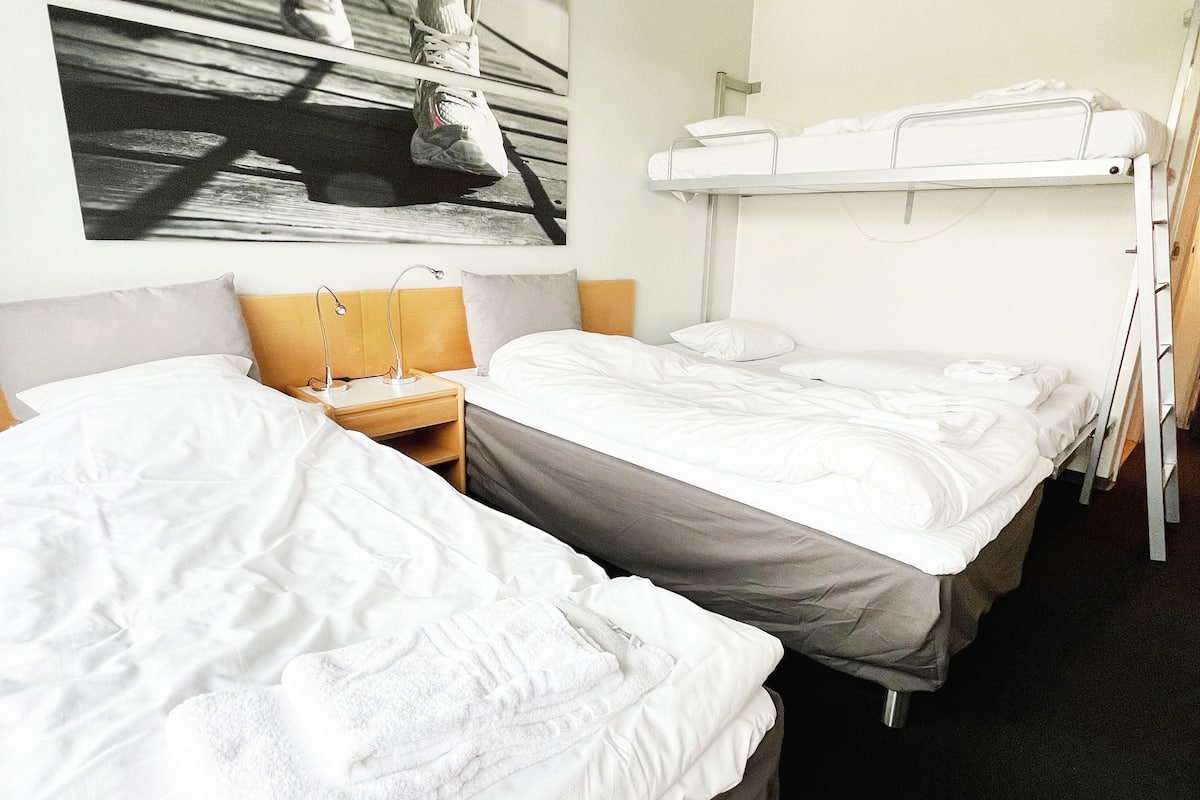 family room | hypo-allergenic bedding, desk, blackout curtains, soundproofing