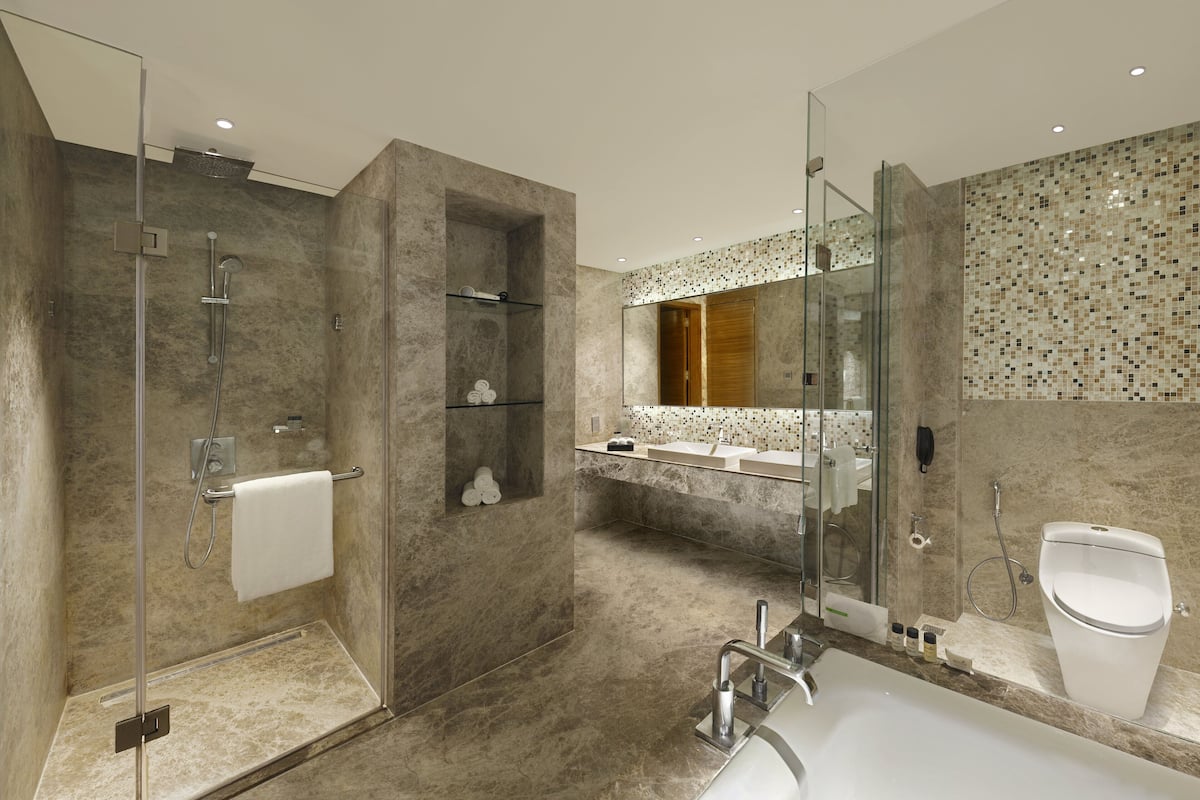 shower, designer toiletries, hair dryer, bathrobes