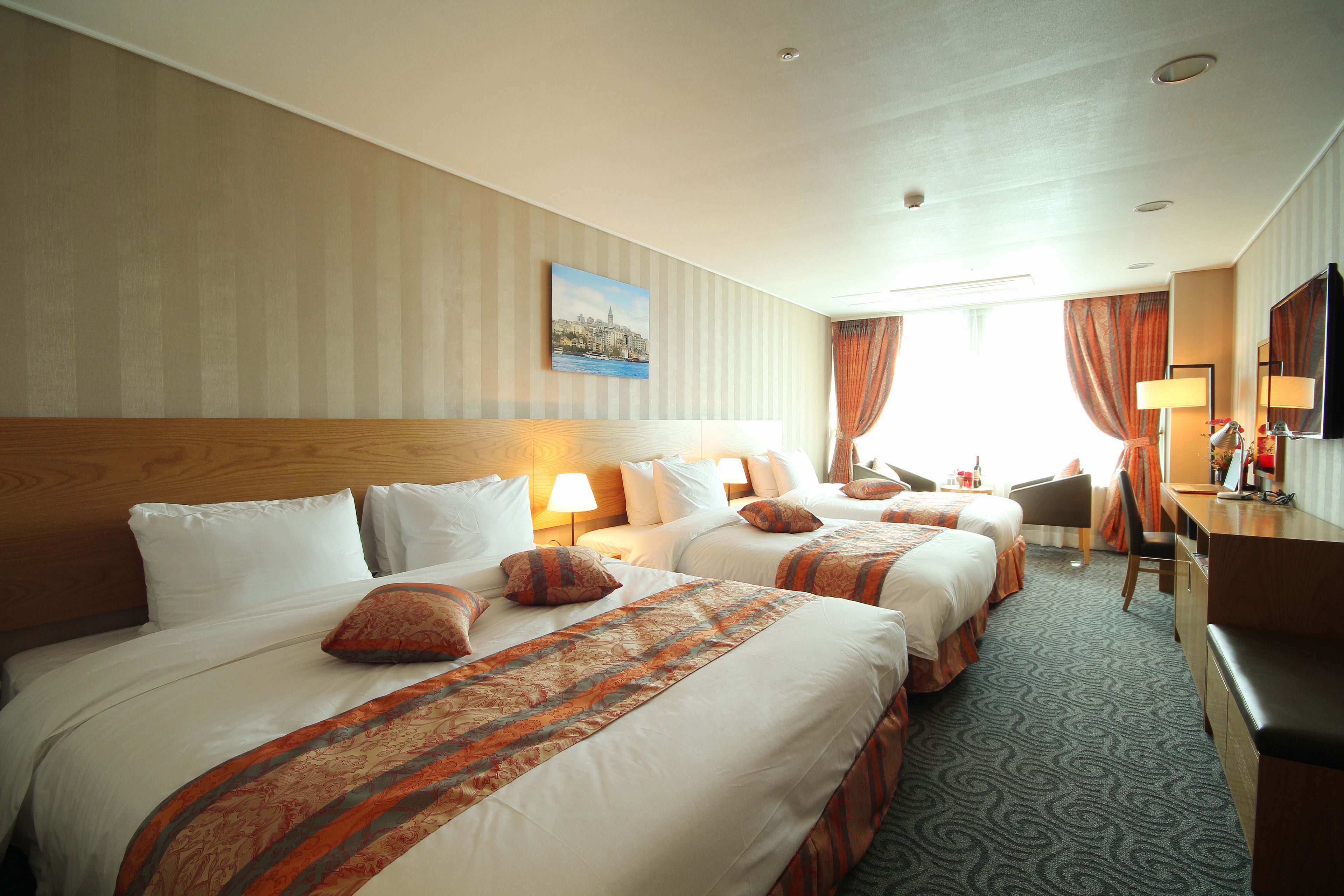 Superior Family Twin Room | Minibar, in-room safe, individually furnished, iron/ironing board