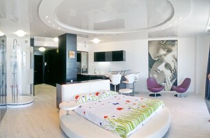 Panoramic Studio Suite, 1 King Bed, Balcony, River View | Desk, laptop workspace, blackout drapes, soundproofing