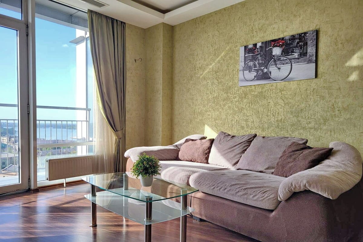 Classic Apartment, 1 Bedroom, Balcony, River View | Living area | Flat-screen TV