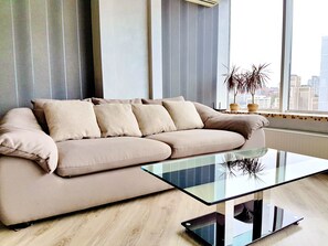 Deluxe Apartment, 1 Bedroom, Kitchen, City View | Living room | Flat-screen TV - Most City Apart-Hotel (Dnipro)
