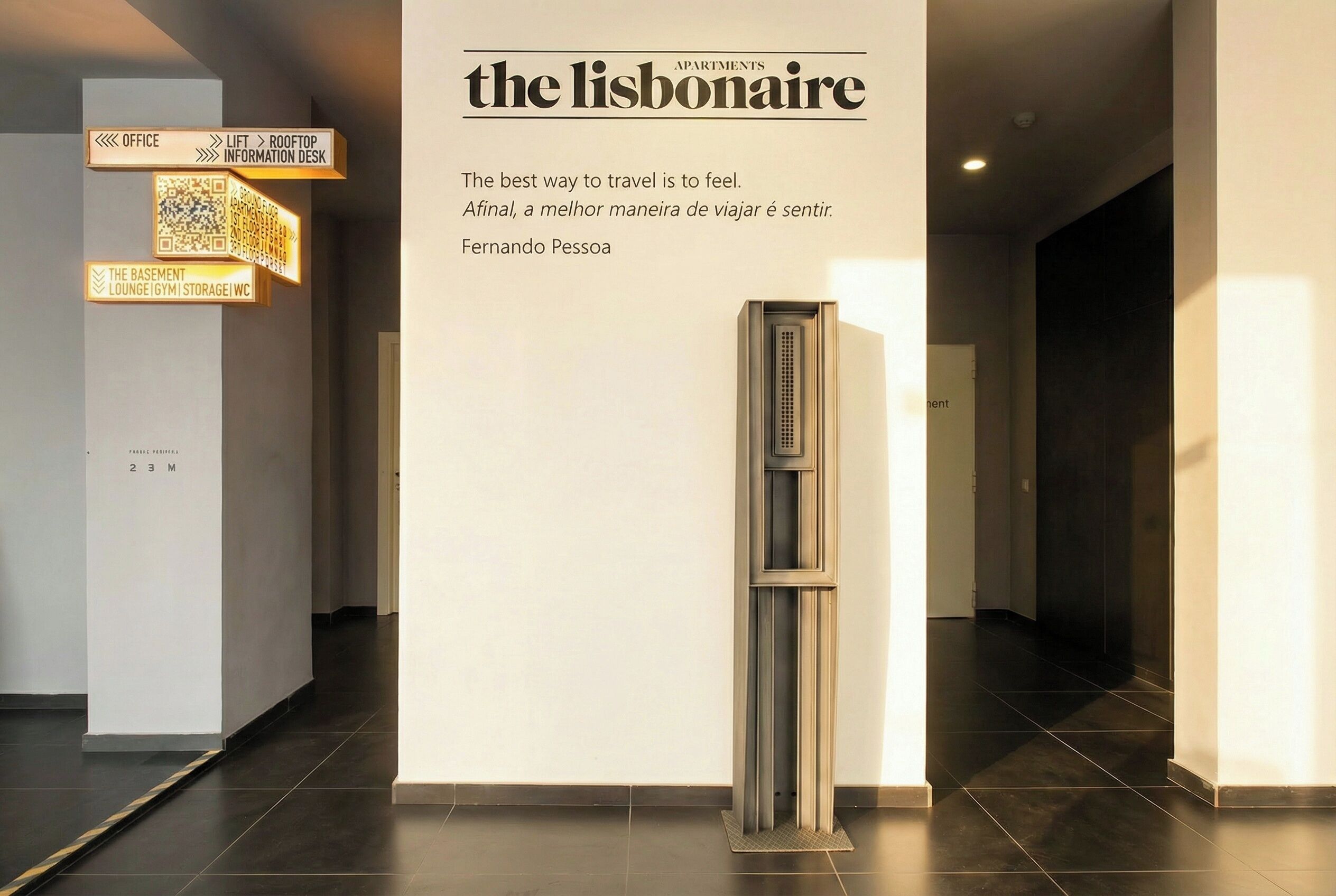 A modern interior with directional signs for office, lift, and rooftop information desk.