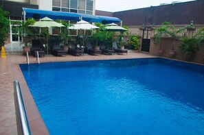 Outdoor pool, pool umbrellas, pool loungers