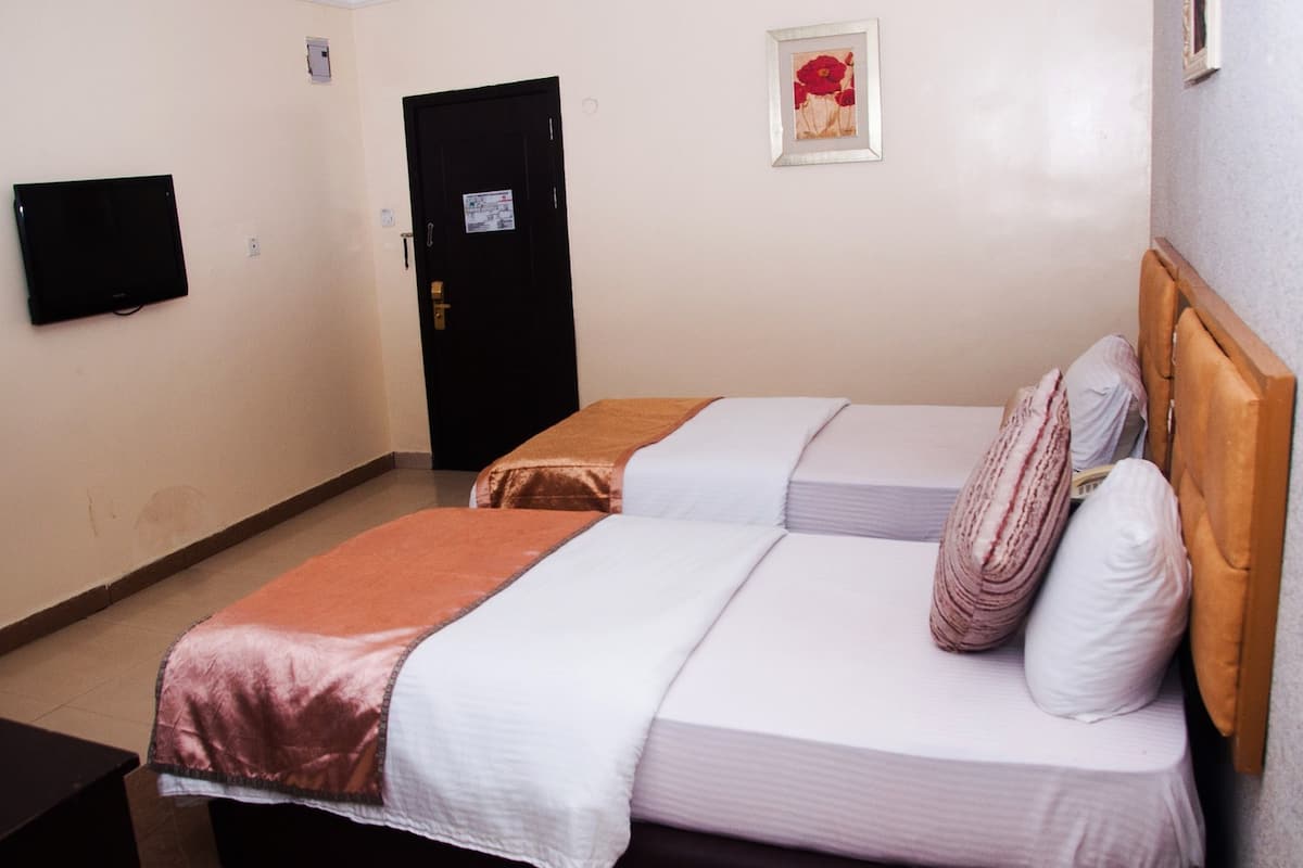 Family Room | In-room safe, desk, free cots/infant beds, rollaway beds