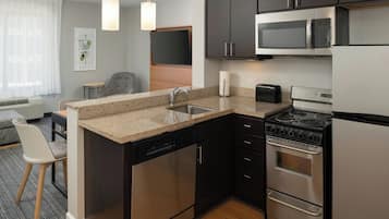 Suite, 2 Bedrooms | In-room safe, laptop workspace, iron/ironing board