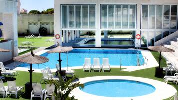 Indoor pool, 2 outdoor pools, open noon to 8:00 PM, pool umbrellas