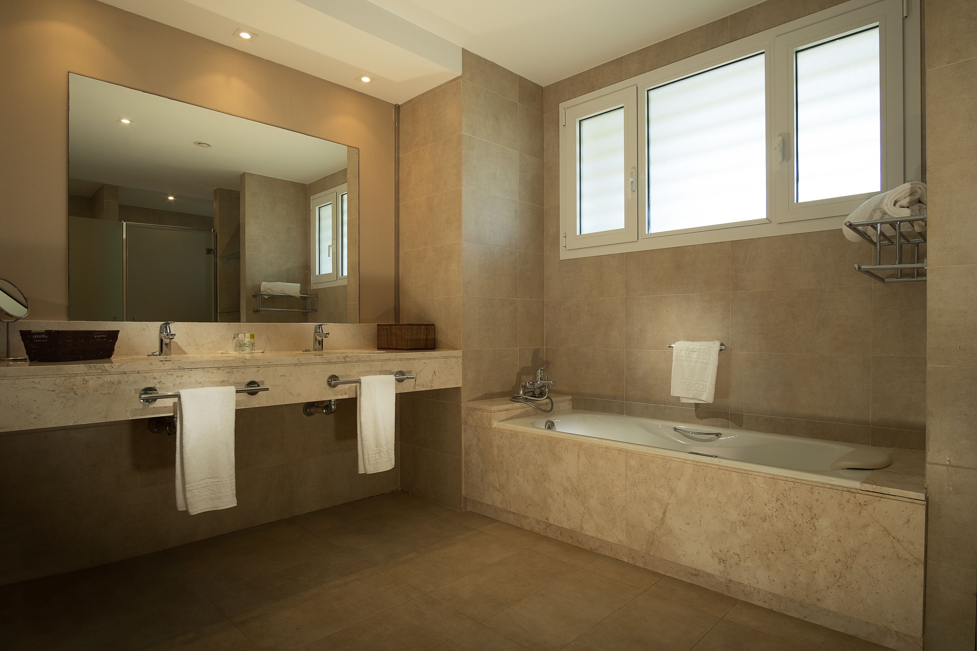 apartment, 3 bedrooms, ocean view | bathroom | separate bathtub and shower, deep-soaking bathtub, free toiletries