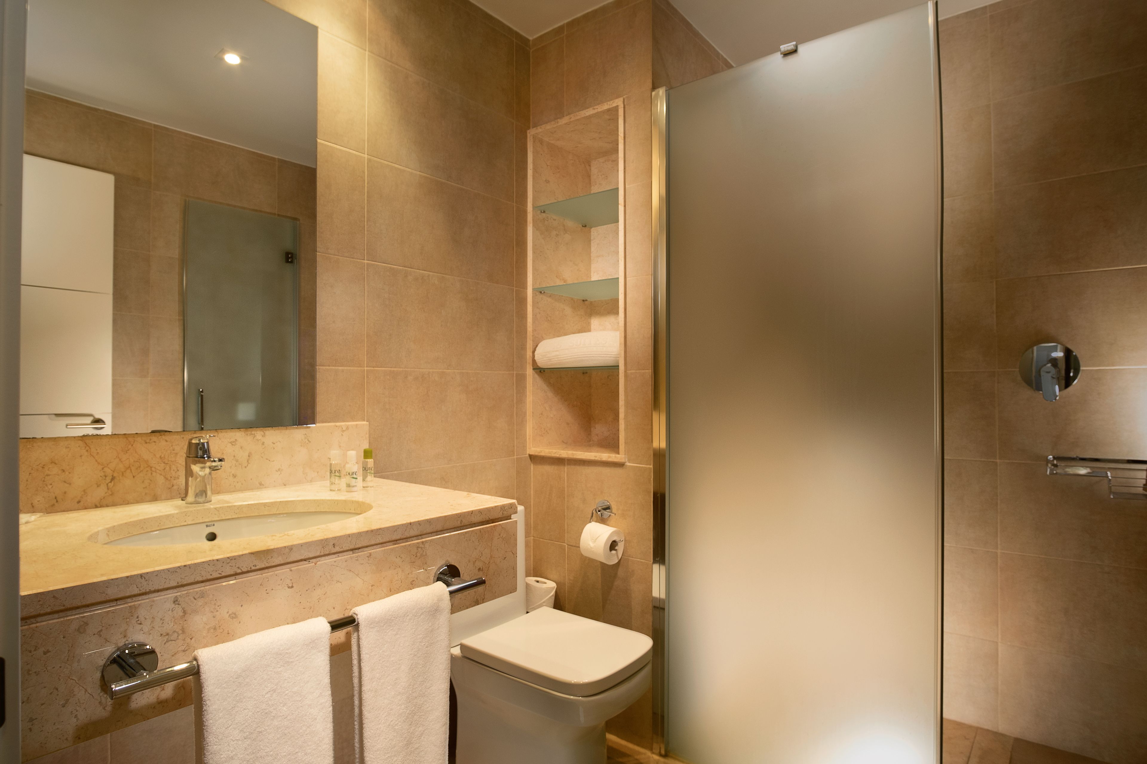 apartment, 2 bedrooms, ocean view | bathroom | separate bathtub and shower, deep-soaking bathtub, free toiletries