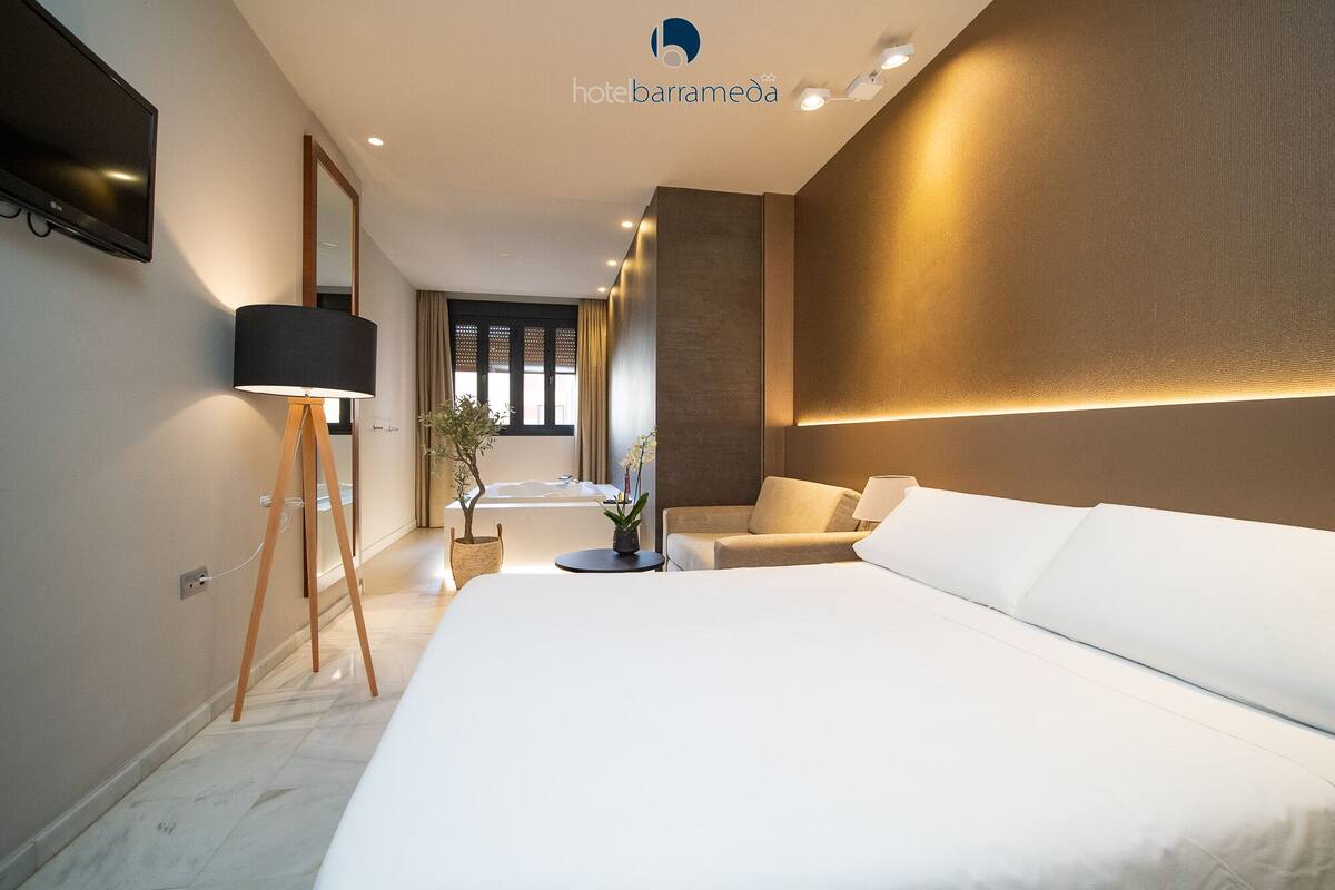 superior double room, jetted tub | in-room safe, desk, free cots/infant beds, free wifi