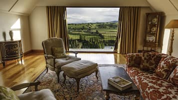 Versace Suite | Living area | Flat-screen TV