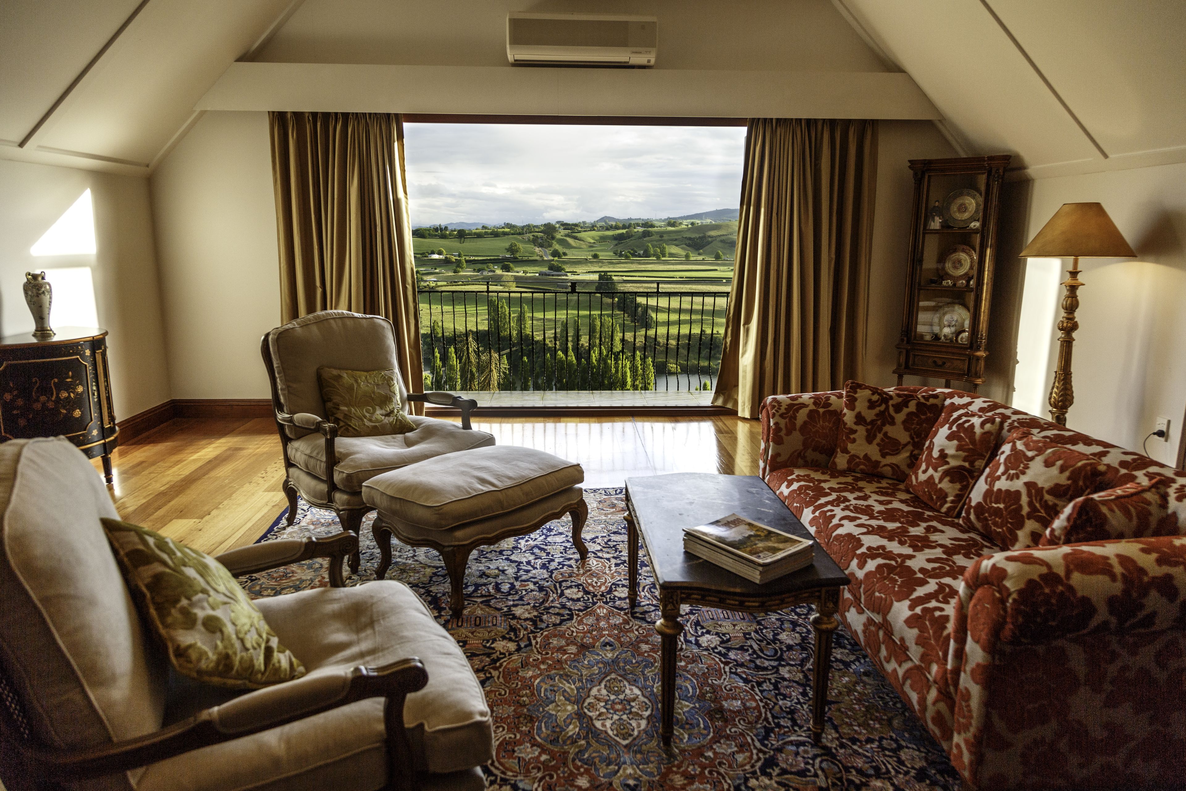 versace suite | living area | flat-screen tv