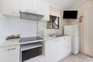 Standard Cabin - Sleeps 6 | Private kitchen | Full-size fridge, microwave, stovetop, electric kettle