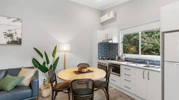 Deluxe Cabin - Sleeps 4 | In-room dining