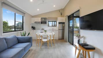 Deluxe Cabin - Sleeps 5 | Living area | LCD TV