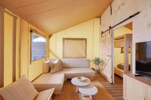Safari Lodge - Sleeps 6 | Living area | 52-cm flat-screen TV with satellite channels, TV