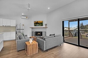 Superior Cabin - Sleeps 2 | Living area | 52-cm flat-screen TV with satellite channels, TV