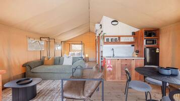 Superior Safari Tent - Sleeps 4 | Living area | Flat-screen TV