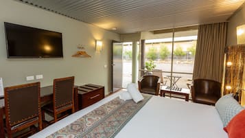 Desk, laptop workspace, blackout curtains, iron/ironing board