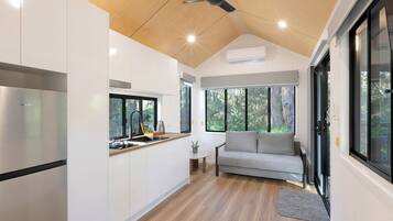 Premium Tiny Home - Sleeps 2 | Living area | 32-inch flat-screen TV with digital channels, LCD TV