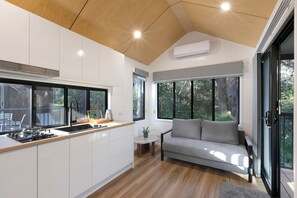Premium Tiny Home - Sleeps 2 | Living area | LCD TV - Reflections Jimmys Beach - Holiday Park (Hawks Nest)