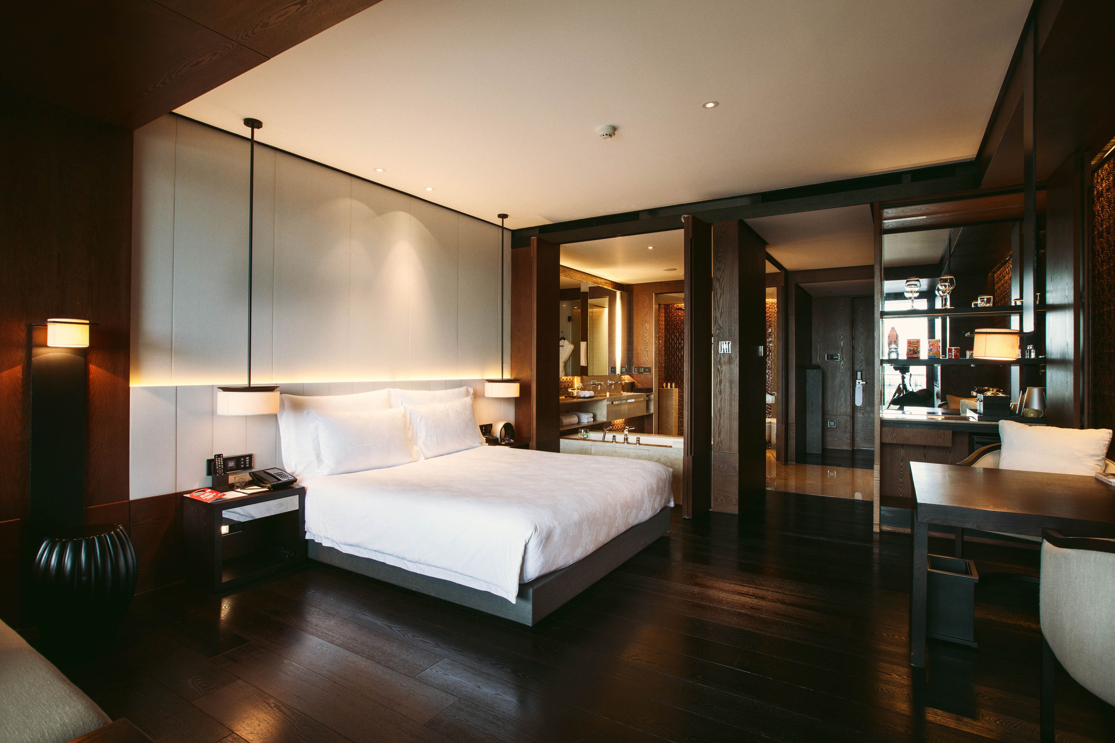 deluxe room, 1 king bed | premium bedding, free minibar items, in-room safe, iron/ironing board