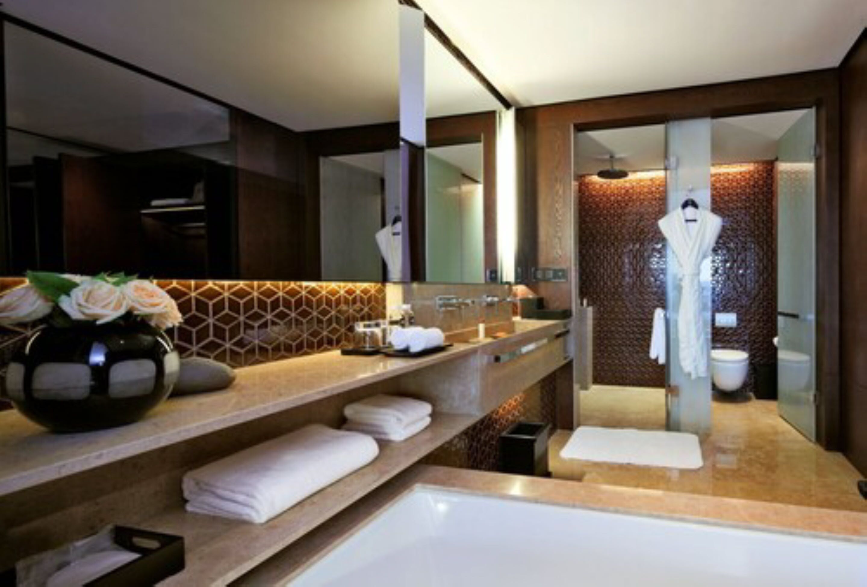 deluxe twin room | bathroom | separate bathtub and shower, designer toiletries, hair dryer, towels