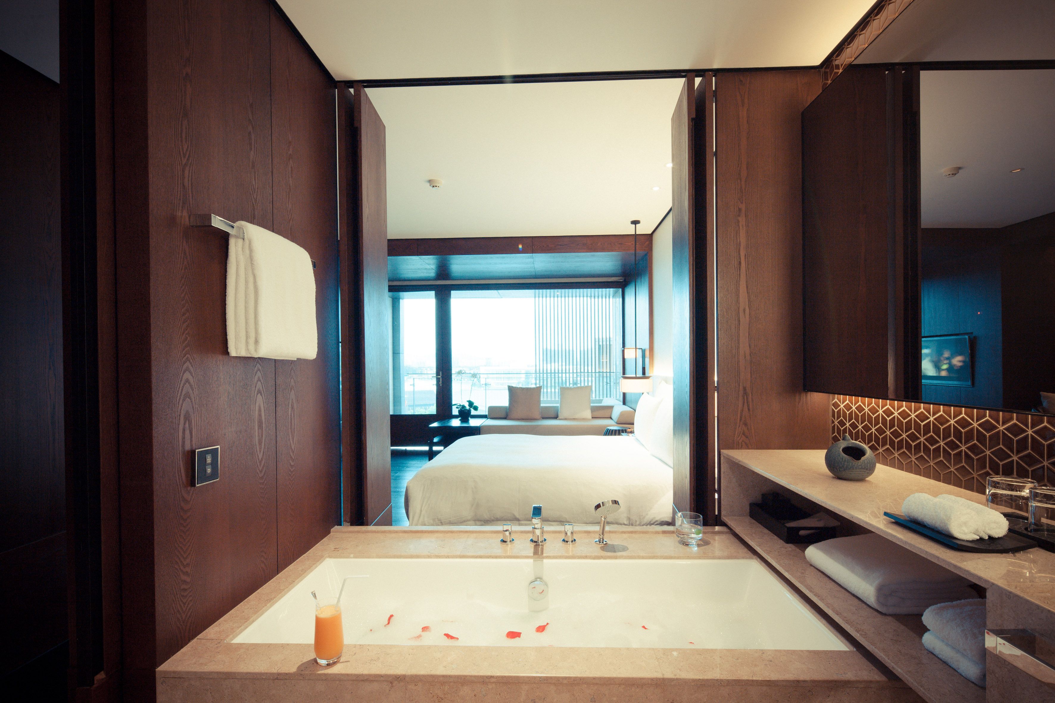 deluxe room, 1 king bed | premium bedding, free minibar items, in-room safe, iron/ironing board