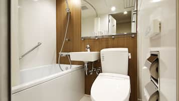 Combined shower/tub, free toiletries, hair dryer, slippers
