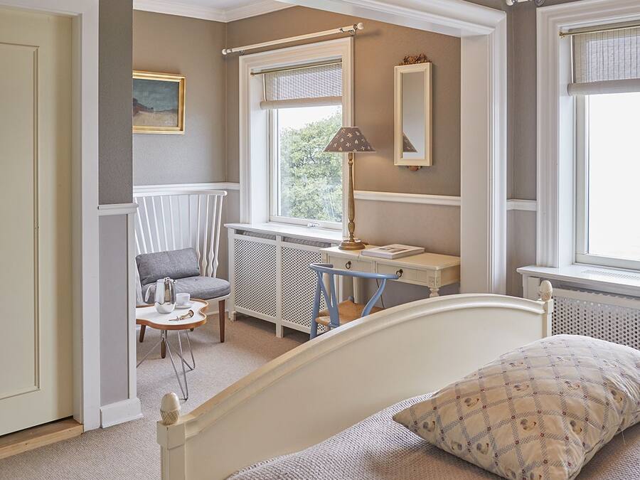 Tweepersoonskamer, uitzicht op zee | Verduisterende gordijnen, een strijkplank/strijkijzer, gratis wifi